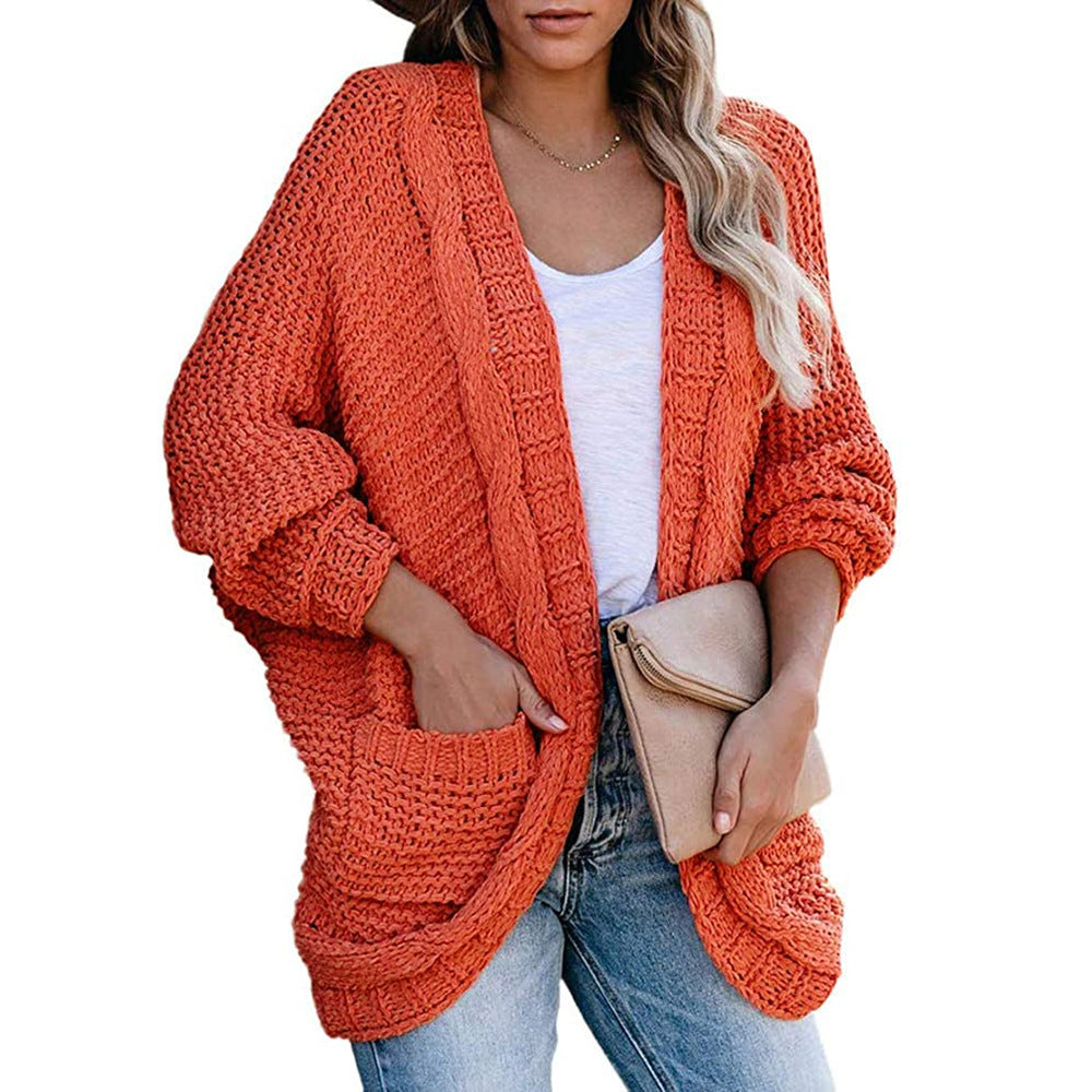 Ladies chunky knit cardigan with open sleeves and spacious pockets Lune London
