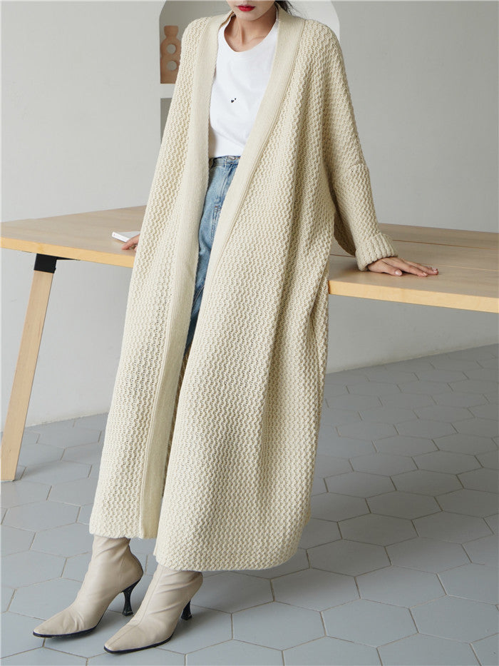 Casual knitted coat for women with open front and voluminous sleeves Lune London