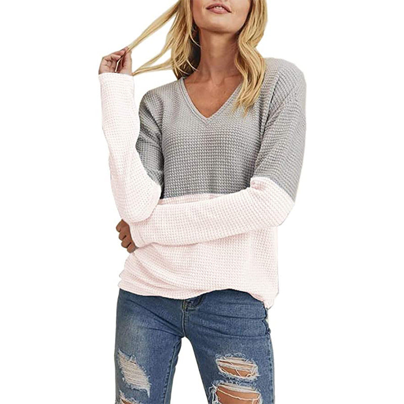 Casual knitted women's sweater with modern color gradient and chic V-neck style