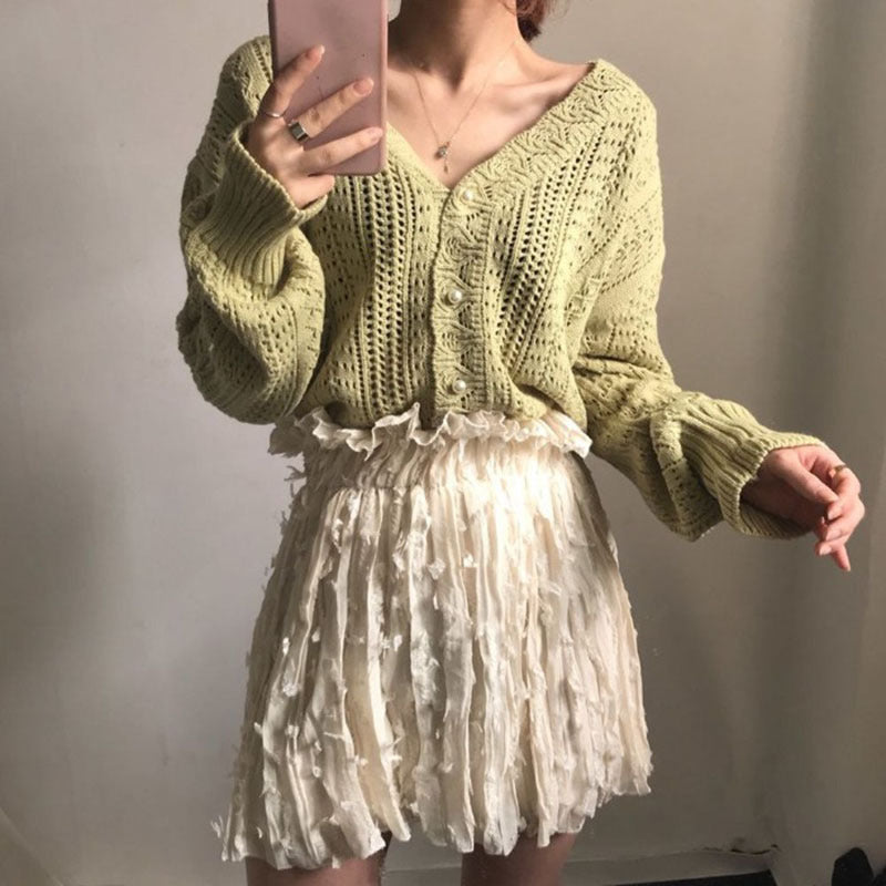 Casual knit jacket for women with an elegant cable pattern and large buttons Lune London