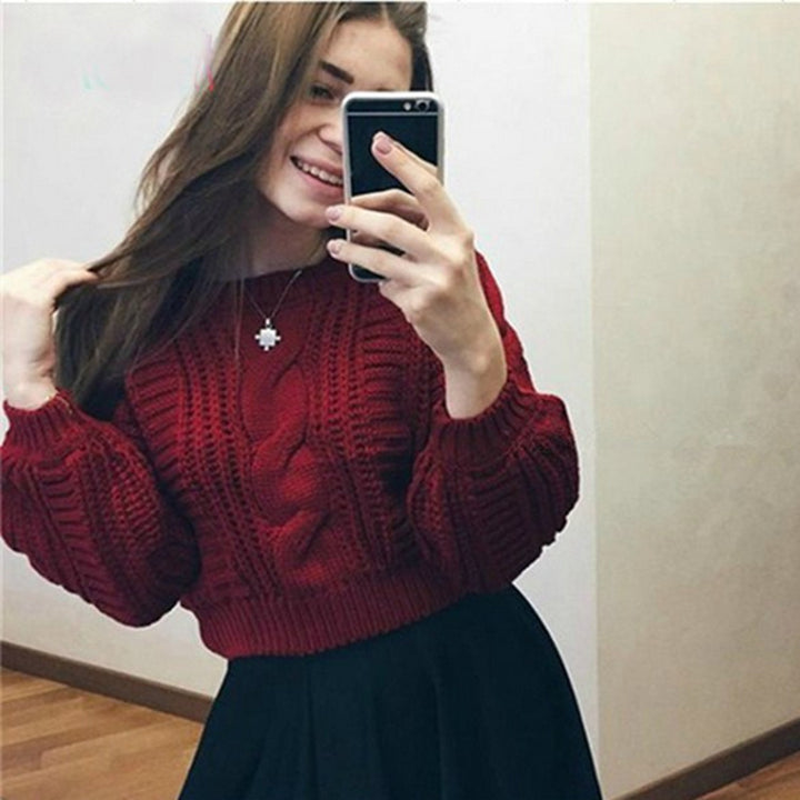 Ladies chunky knit sweater with prominent cable knit detail and wide sleeves Lune London