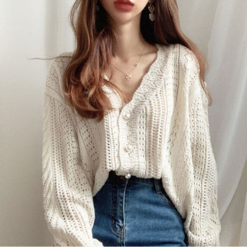 Casual knit jacket for women with an elegant cable pattern and large buttons Lune London