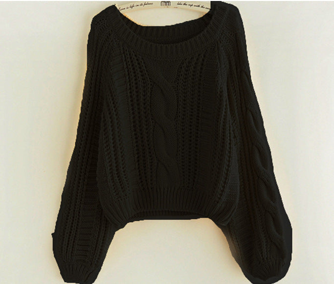 Ladies chunky knit sweater with prominent cable knit detail and wide sleeves Lune London