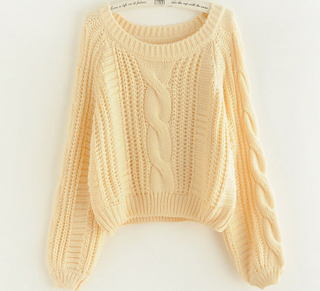 Ladies chunky knit sweater with prominent cable knit detail and wide sleeves Lune London