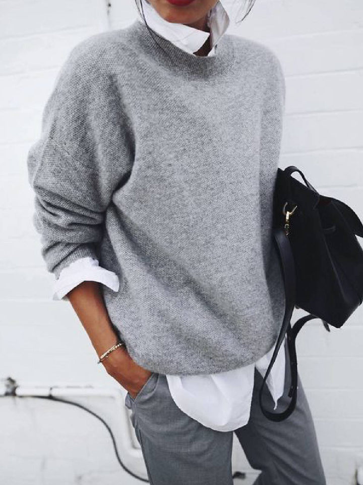 Pull féminin doux à col rond en mélange de tricots fins Chic & Stil