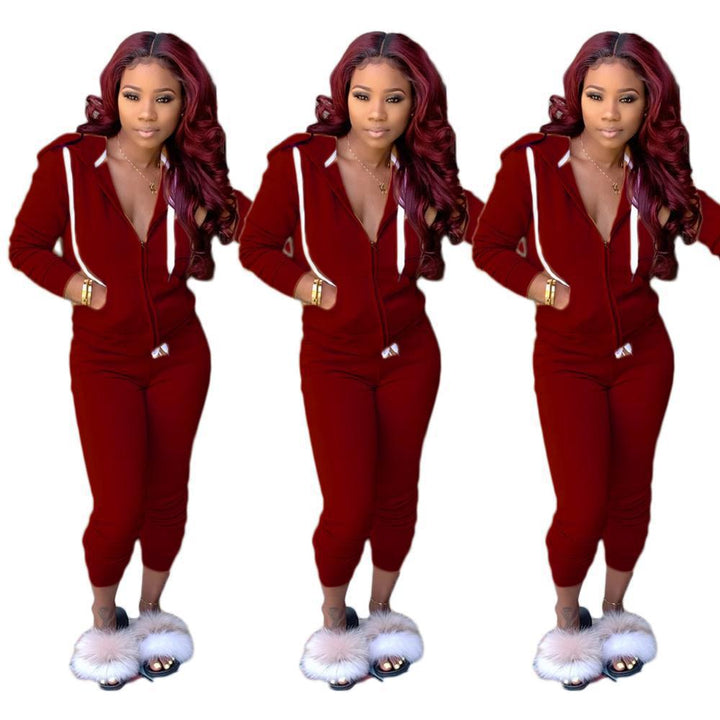 Women Sporty Jumpsuit with Hood and Side Pockets Lune London