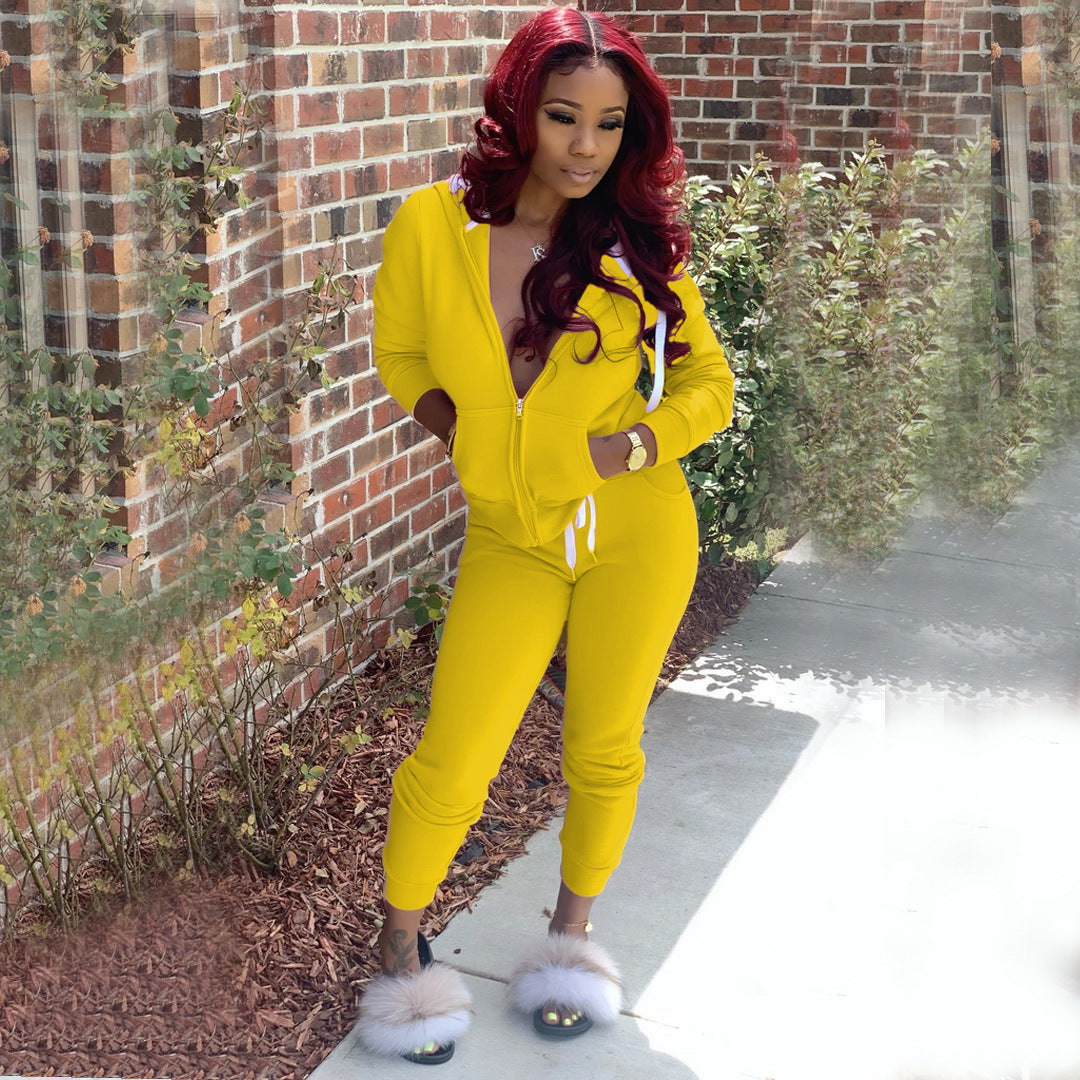 Women Sporty Jumpsuit with Hood and Side Pockets Lune London