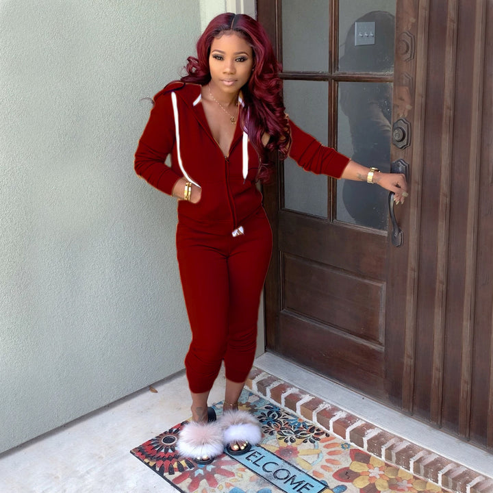 Women Sporty Jumpsuit with Hood and Side Pockets Lune London