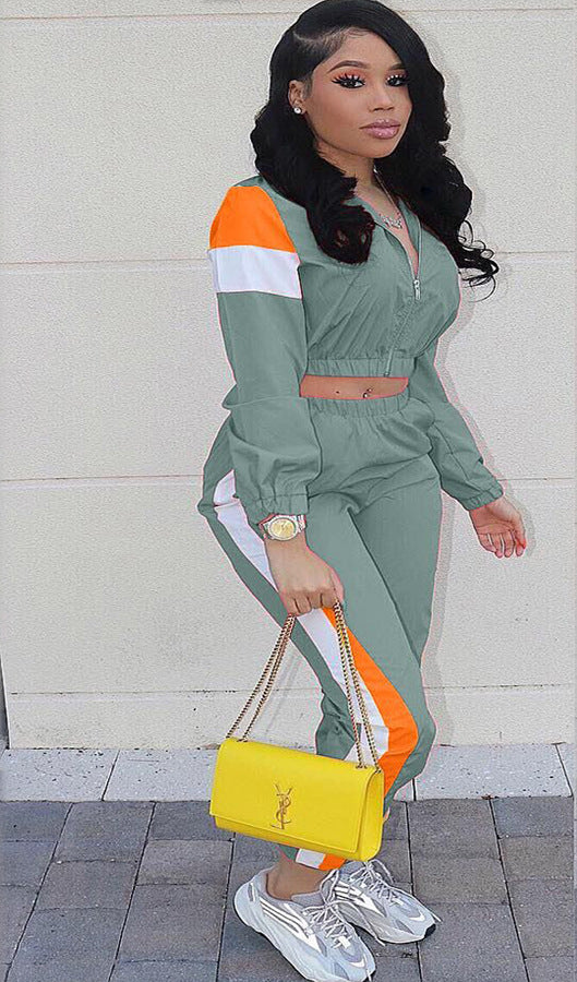 Women Elegant sports set with a trendy crop-top and slim joggers Lune London