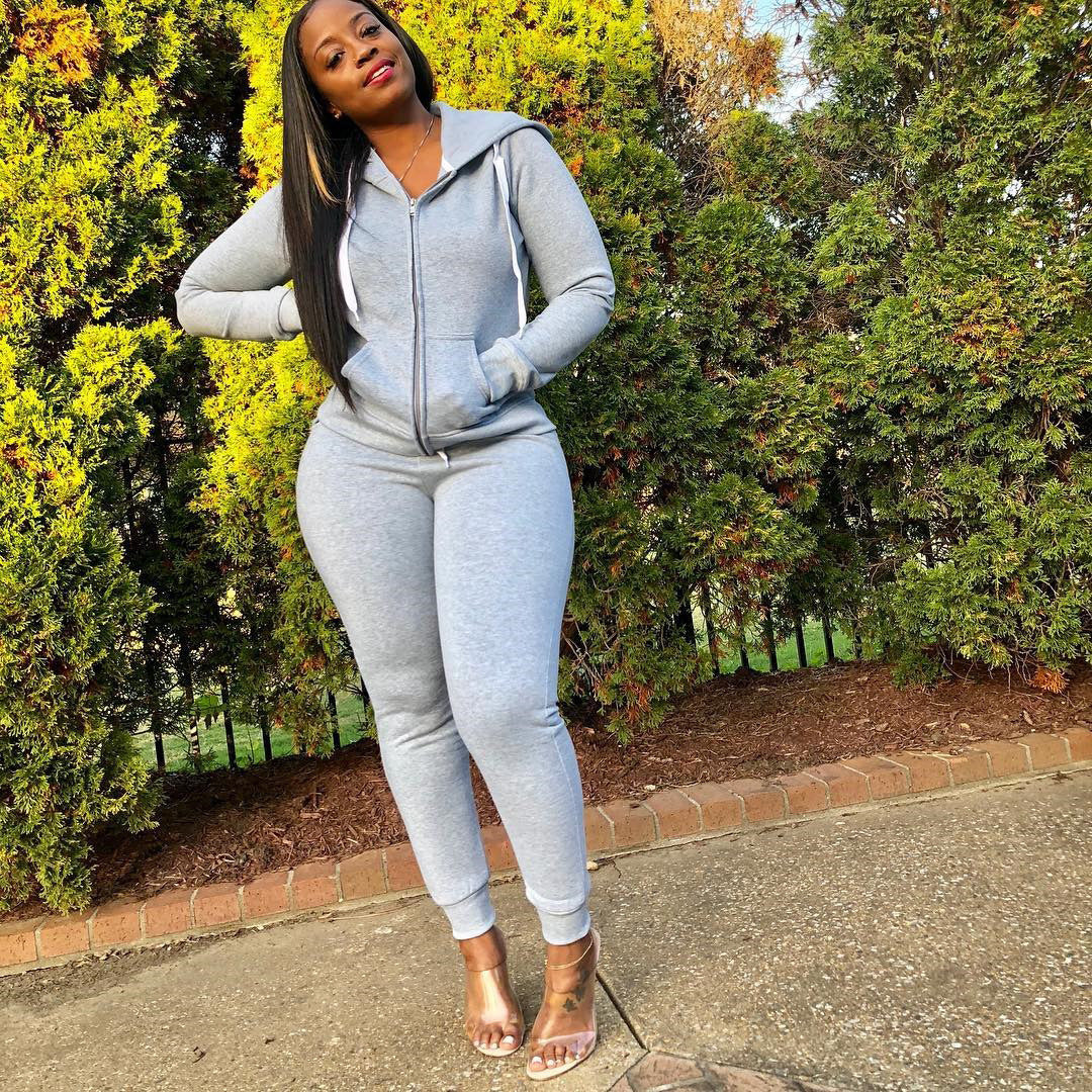 Women Sporty Jumpsuit with Hood and Side Pockets Lune London