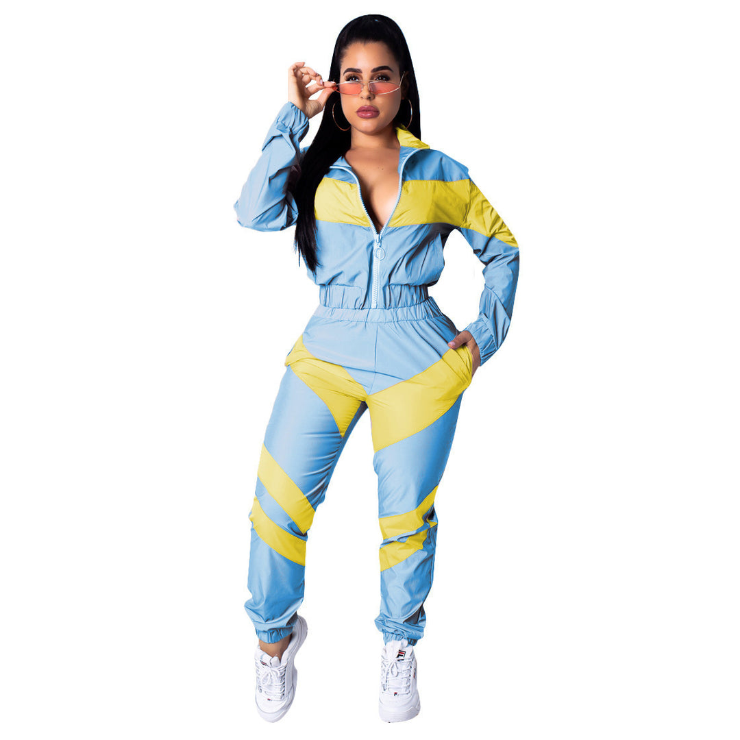 Ladies sporty jumpsuit with stylish color block elements and a high collar Lune London