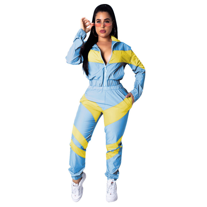 Ladies sporty jumpsuit with stylish color block elements and a high collar Lune London