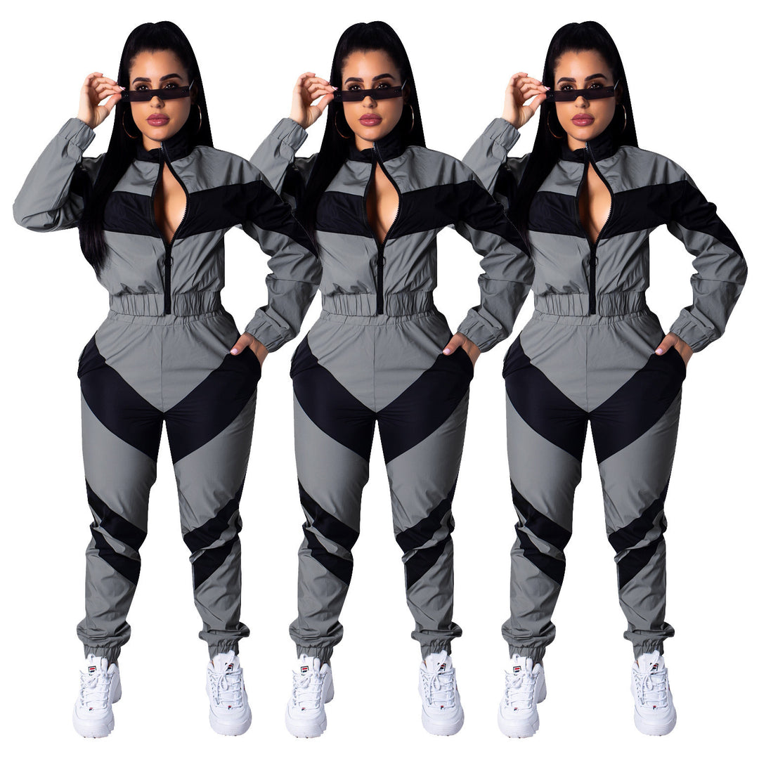 Ladies sporty jumpsuit with stylish color block elements and a high collar Lune London