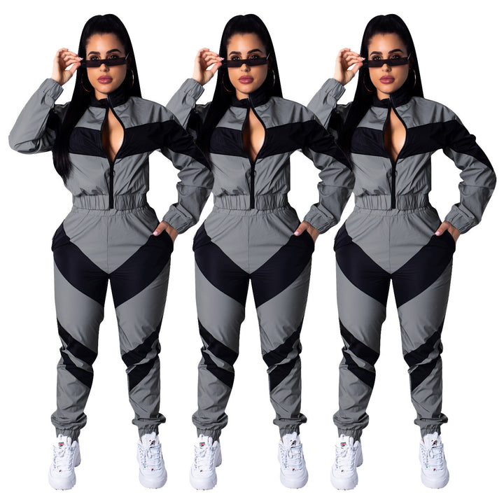 Ladies sporty jumpsuit with stylish color block elements and a high collar Lune London