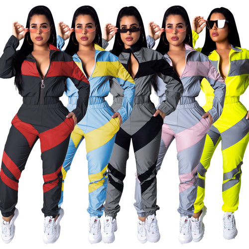 Ladies sporty jumpsuit with stylish color block elements and a high collar Lune London