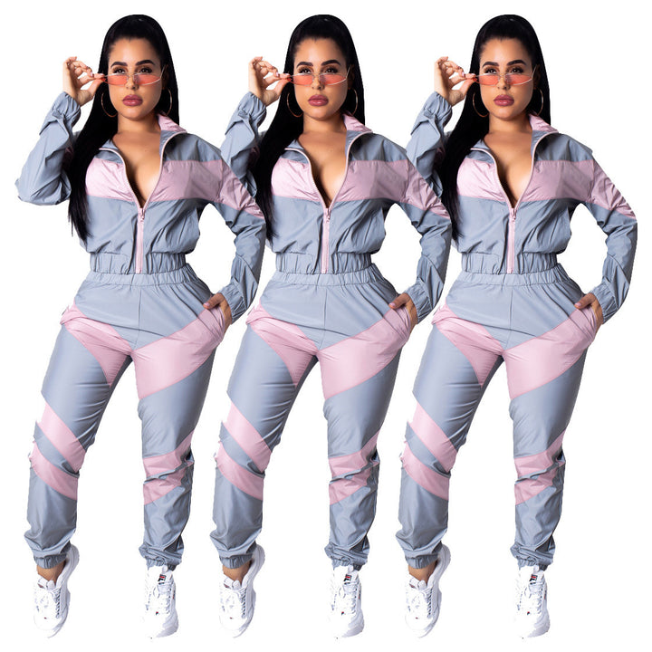 Ladies sporty jumpsuit with stylish color block elements and a high collar Lune London
