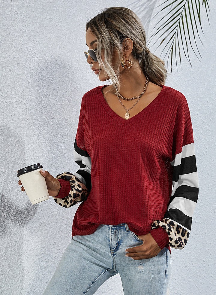 Women V-neck sports top with striking sleeves and unique details Lune London