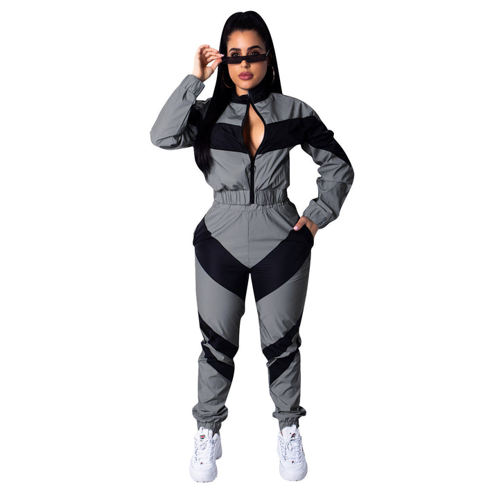 Ladies sporty jumpsuit with stylish color block elements and a high collar Lune London