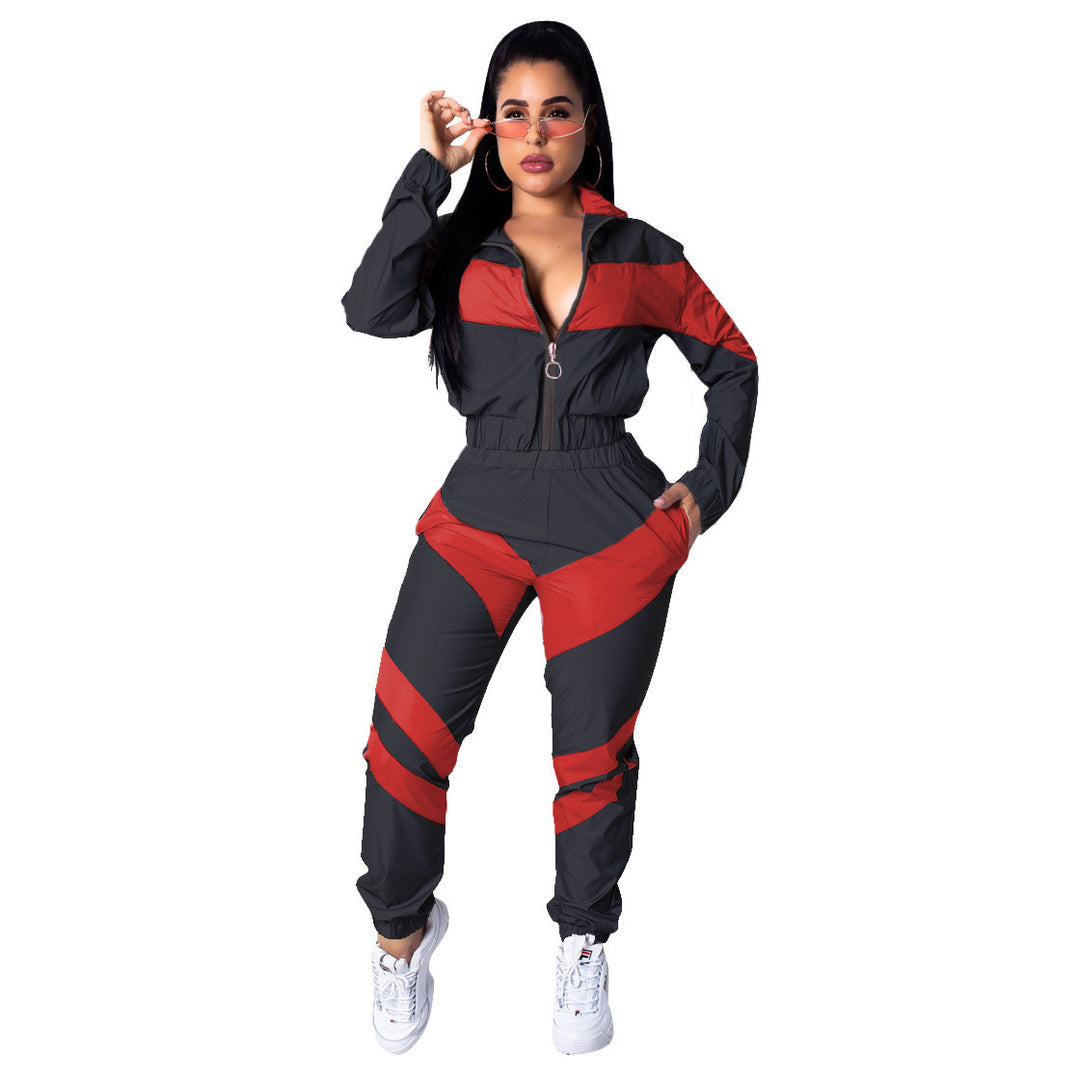 Ladies sporty jumpsuit with stylish color block elements and a high collar Lune London