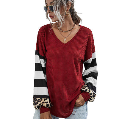 Women V-neck sports top with striking sleeves and unique details Lune London