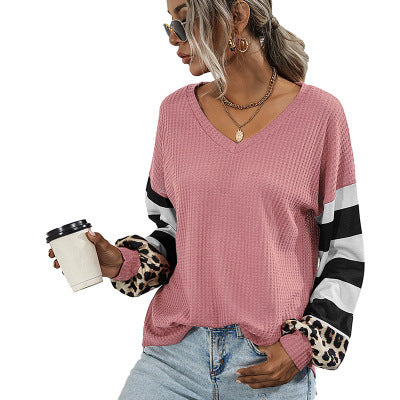 Women V-neck sports top with striking sleeves and unique details Lune London