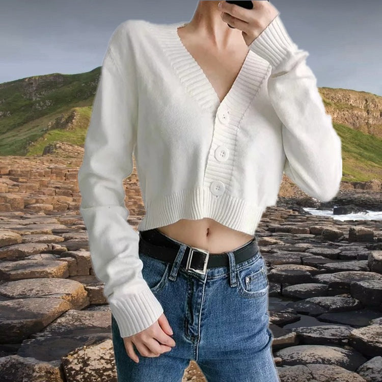Ladies short knitted vest with V-neck and button details Lune London