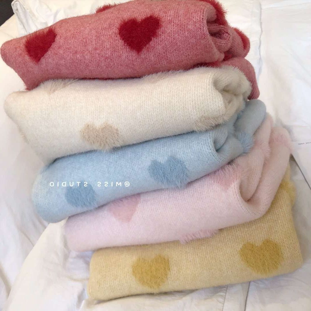 Pull confortable pour femmes avec un motif en cœur et un matériau doux Chic & Stil