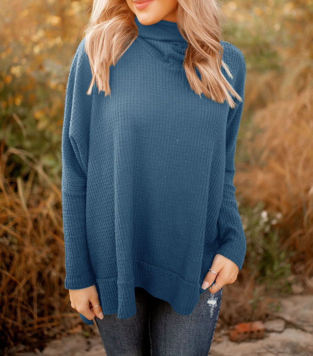 Pull décontracté pour femmes avec col montant et tissu texturé Chic & Stil