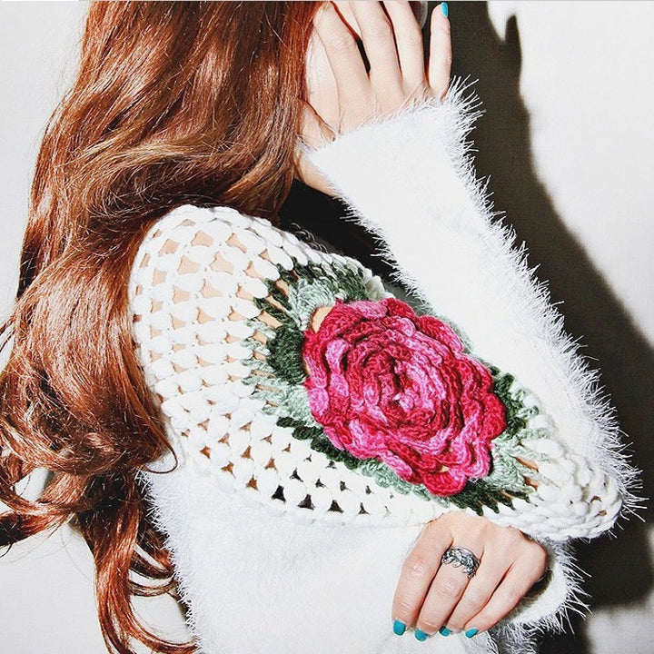 Women's knit sweater with floral accents Lune London