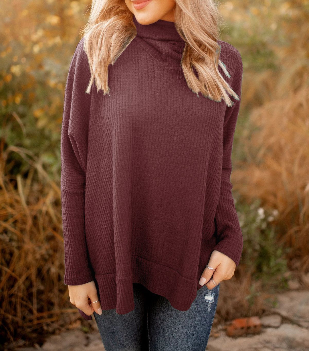 Pull décontracté pour femmes avec col montant et tissu texturé Chic & Stil