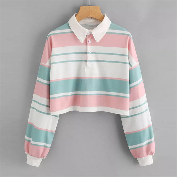 Women's polo shirt in a casual crop design with a stylish color block pattern Chic & Stil
