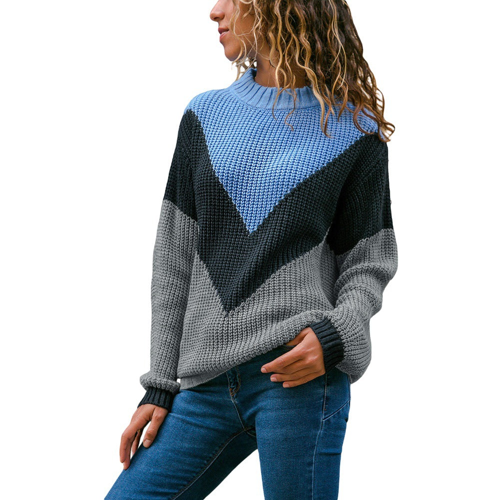 Women's thick knit sweater with a modern V-neck and a chic color block design