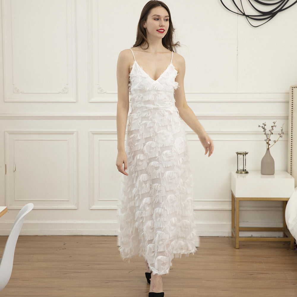 Ladies maxi dress with trendy fringes and seductive V-neck Lune London