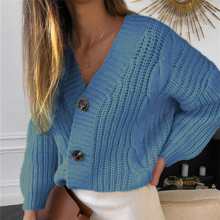 Ladies knitted cardigan with a beautiful cable pattern and stylish button details Lune London
