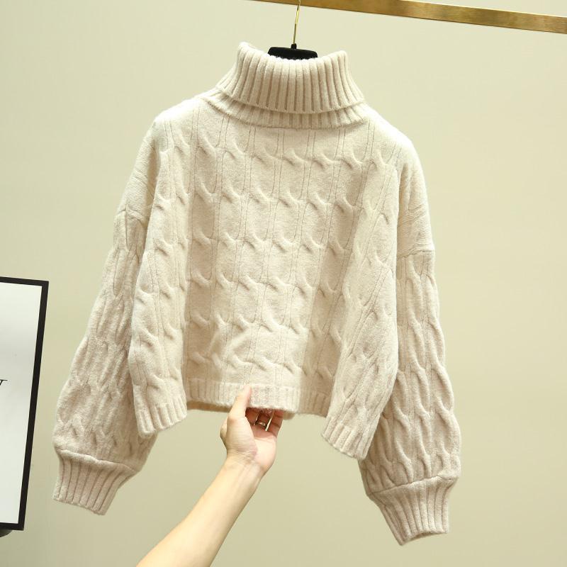 Chunky knit cozy sweater for women with high collar and cable pattern Lune London