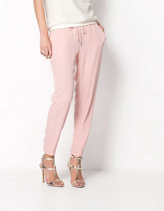 Light leisure pants for women with elastic waist and zipped pockets on the sides Lune London