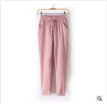 Light leisure pants for women with elastic waist and zipped pockets on the sides Lune London
