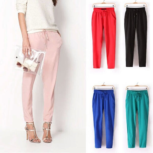 Light leisure pants for women with elastic waist and zipped pockets on the sides Lune London