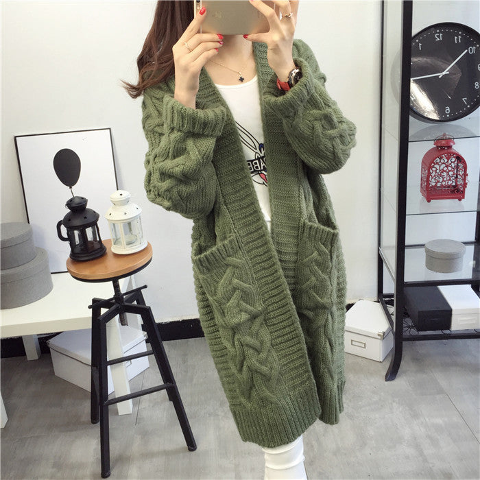 Chunky knit cardigan for women with elegant braided pattern and practical pockets Lune London