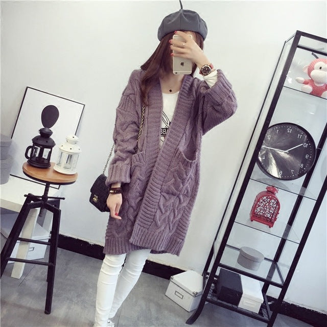 Chunky knit cardigan for women with elegant braided pattern and practical pockets Lune London