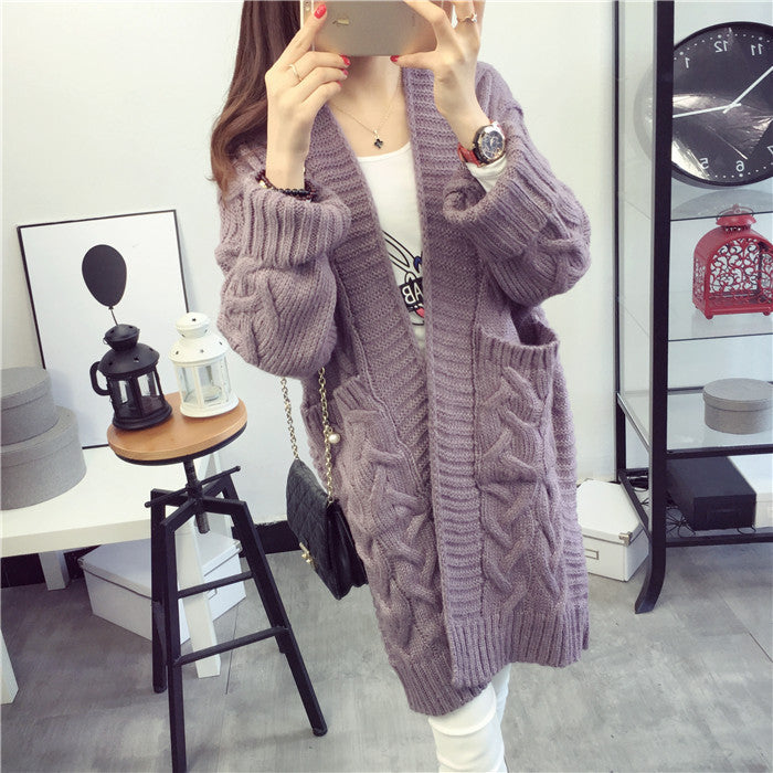 Chunky knit cardigan for women with elegant braided pattern and practical pockets Lune London