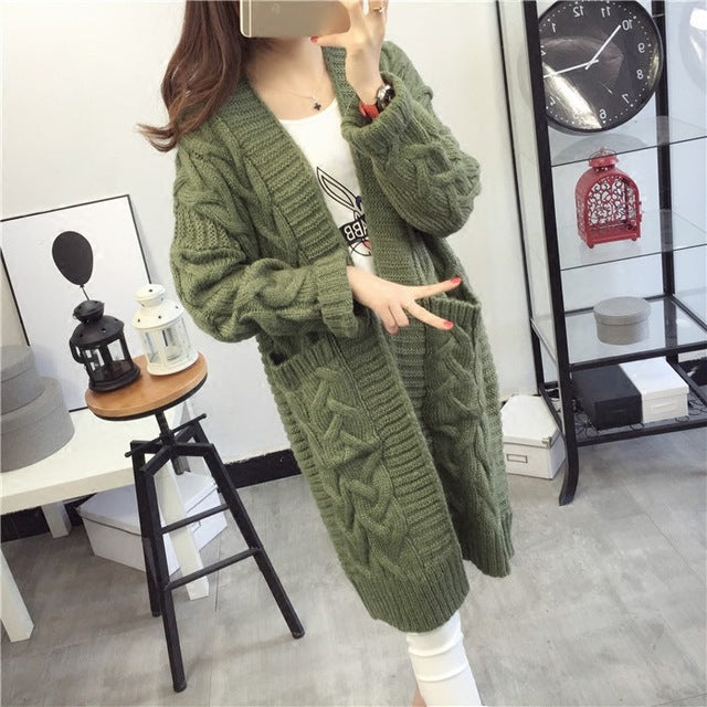 Chunky knit cardigan for women with elegant braided pattern and practical pockets Lune London