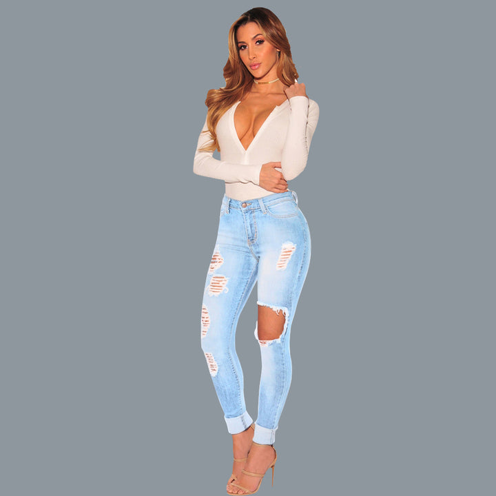 Skinny jeans for women with a modern worn look featuring striking ripped details Lune London