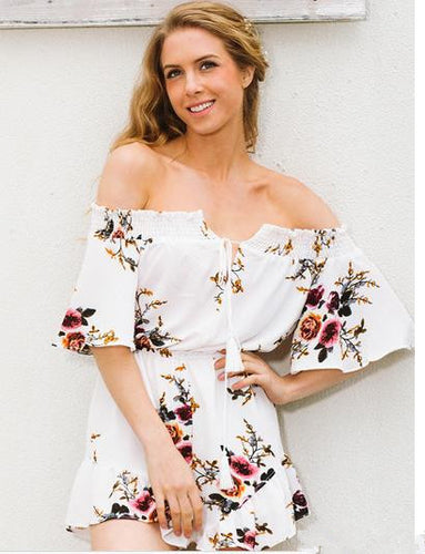 Combinaison femme sans épaule avec design floral et détails volantés Chic & Stil