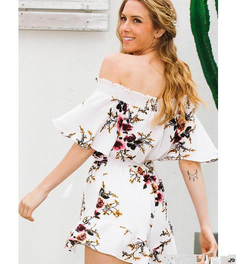 Combinaison femme sans épaule avec design floral et détails volantés Chic & Stil