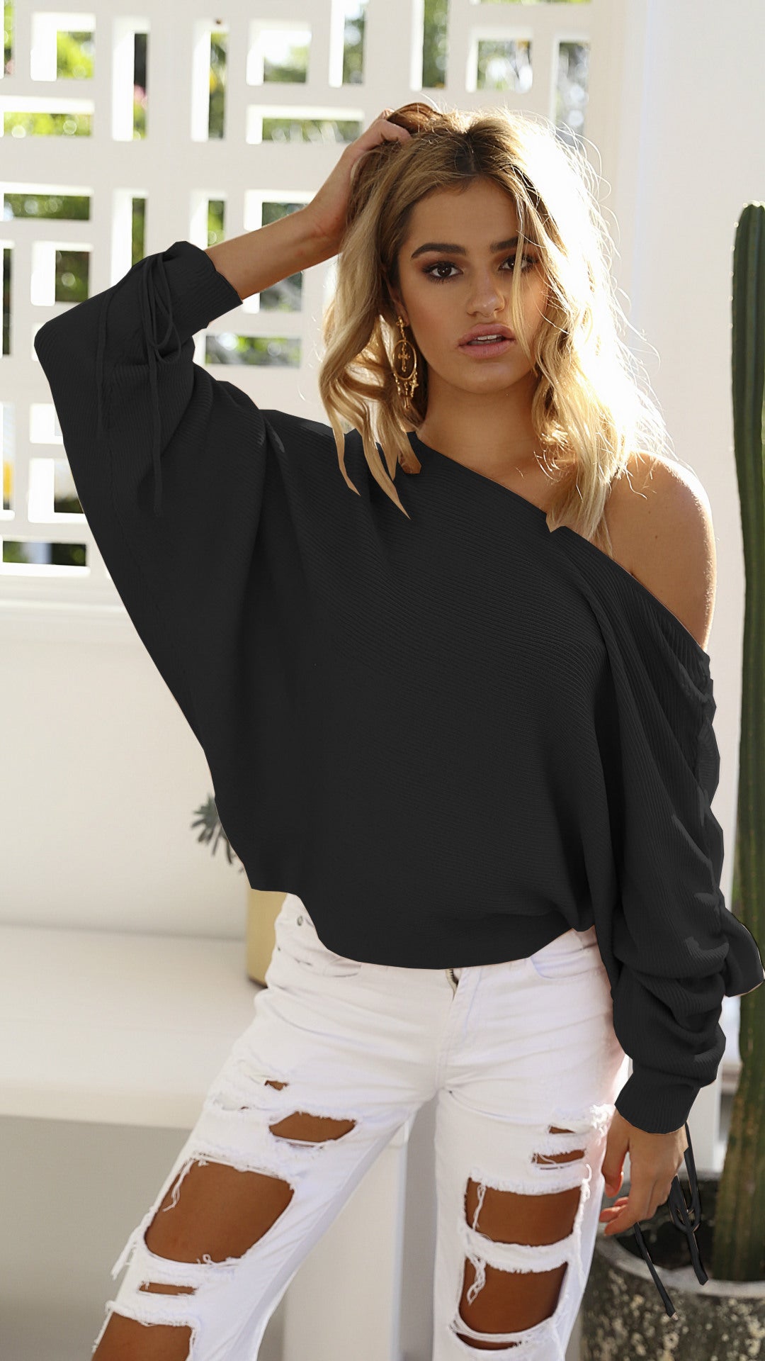 Sweater femme oversize avec coupe asymétrique et détails décontractés Chic & Stil
