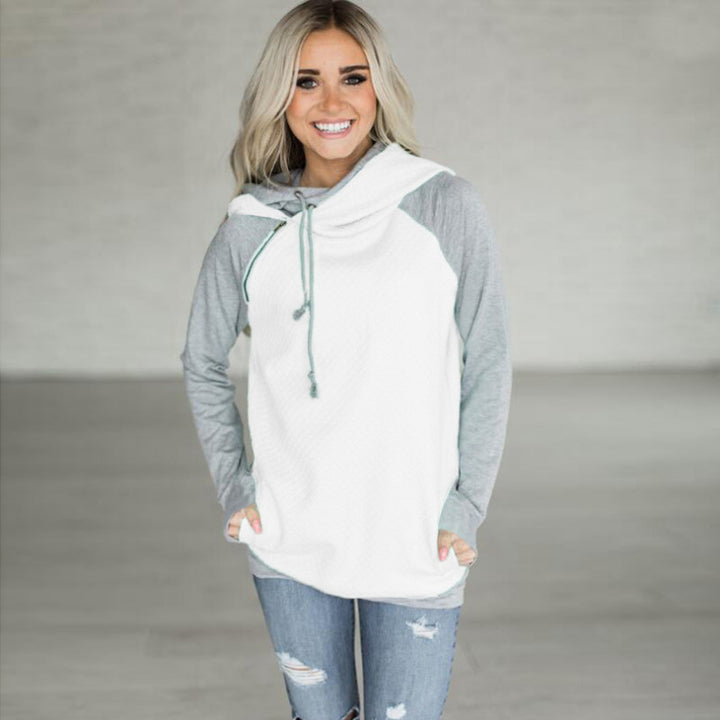 Sweat à capuche sport pour femmes avec design respirant et coupe décontractée Chic & Stil