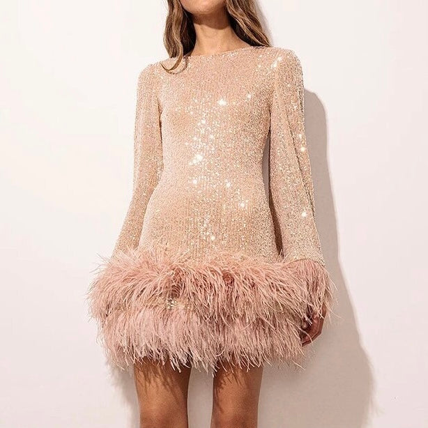 Lune London | Glamorous dress with sequins and feather hem