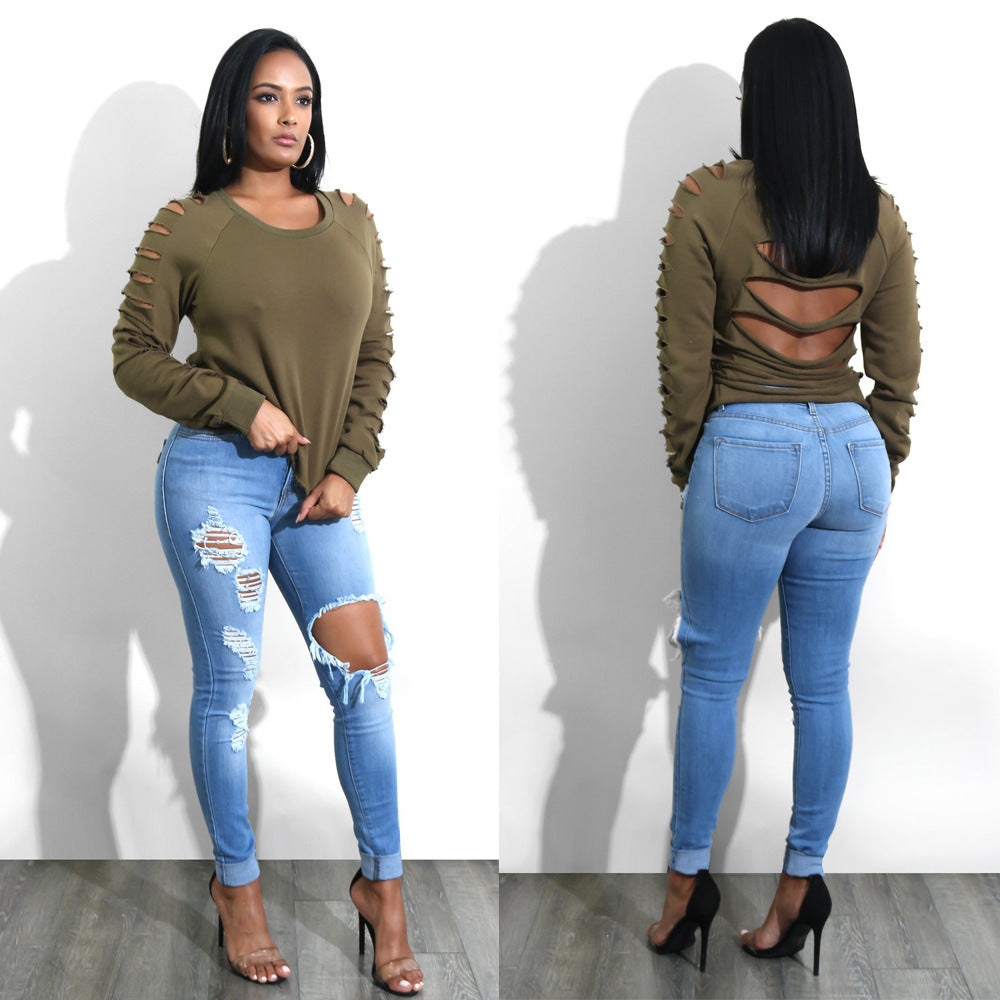 Fashionable oversized women's sweater with exciting cut-outs and a relaxed fit Lune London
