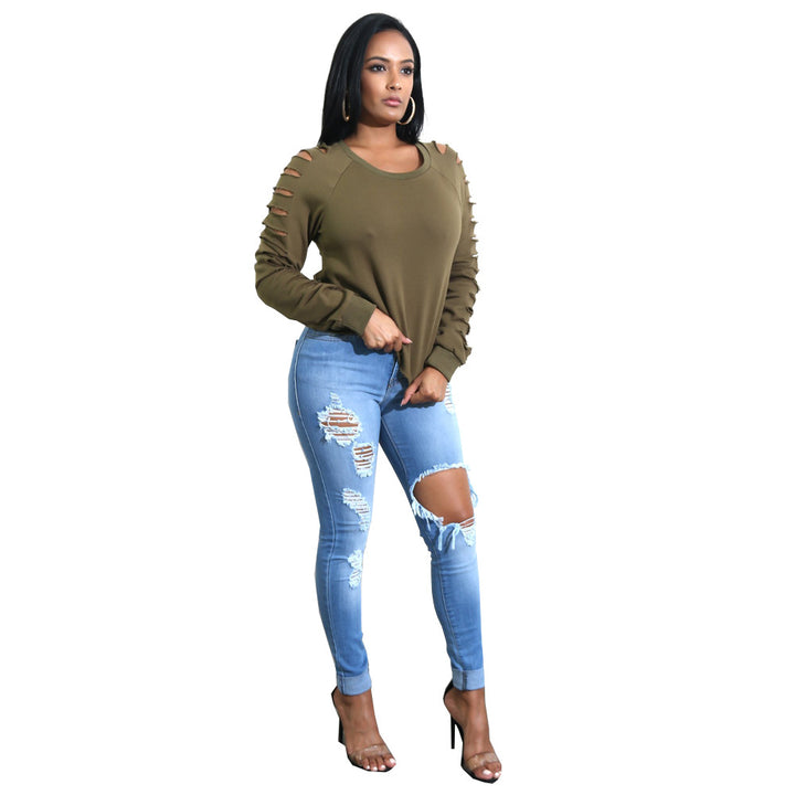 Fashionable oversized women's sweater with exciting cut-outs and a relaxed fit Lune London